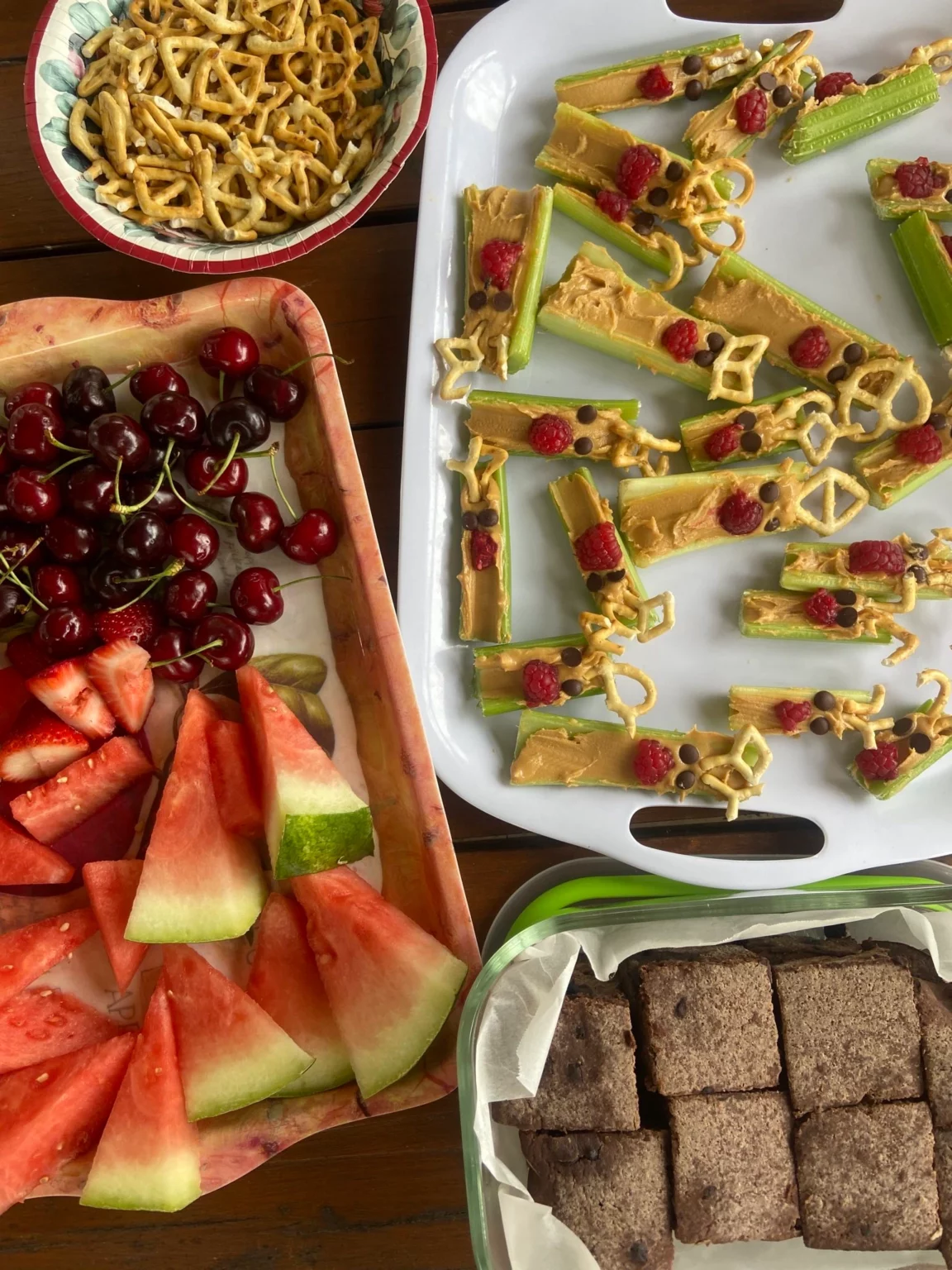 Fruit platter, peanut butter celery sticks, pretzels, and brownies